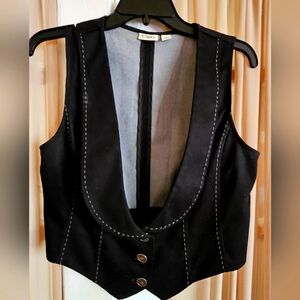 Black Cato vest with white stitching.